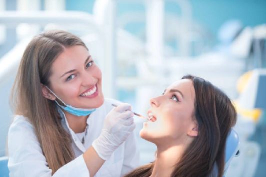 dentist and a dental hygienist